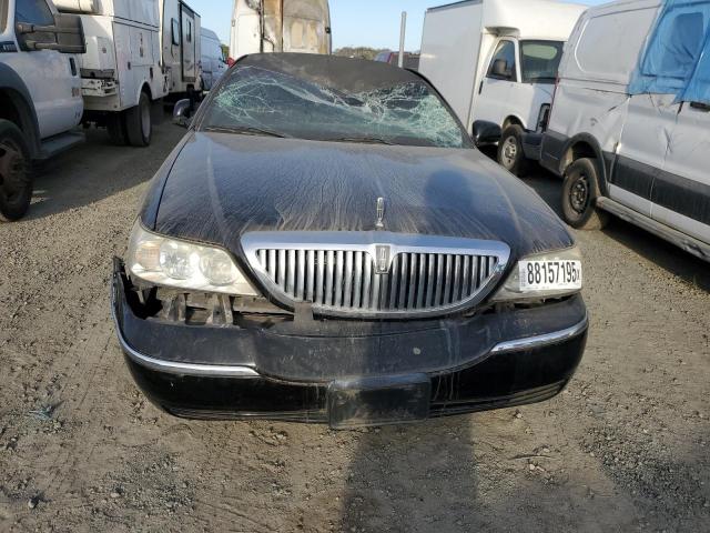 Photo 5 from auction – 2005 LINCOLN TOWN CAR E with VIN 1L1FM88W25Y663114