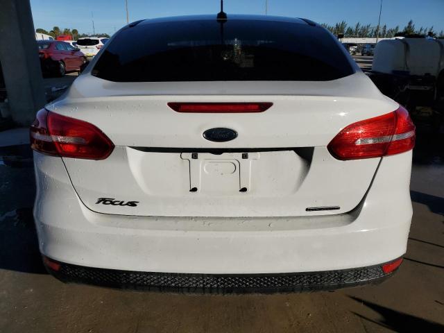 Photo 6 from auction – 2016 FORD FOCUS S with VIN 1FADP3E2XGL383663