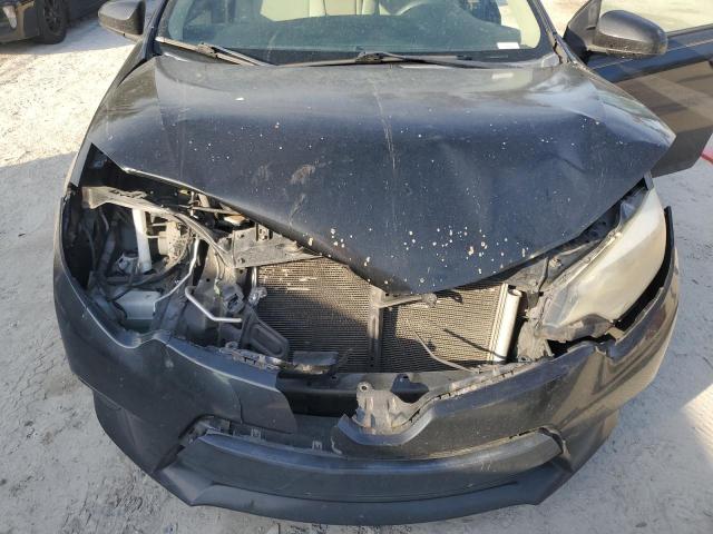 Photo 11 from auction – 2014 TOYOTA COROLLA L with VIN 2T1BURHE4EC057008