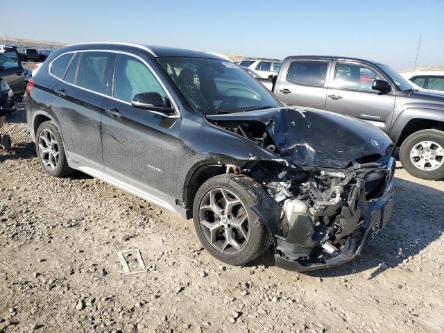 Photo 4 from auction – 2016 BMW X1 XDRIVE2 with VIN WBXHT3C35G5E53423