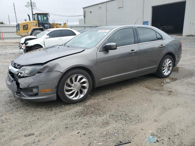 FORD FUSION SE 2011 with VIN 3FAHP0HA0BR164563 - Photo from auction
