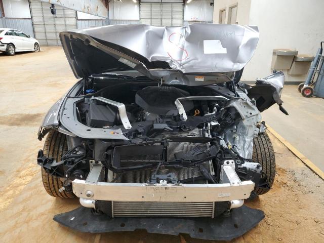 Photo 5 from auction – 2023 GENESIS G70 BASE with VIN KMTG34TA2PU131582