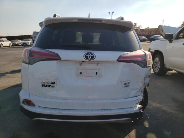 Photo 6 from auction – 2017 TOYOTA RAV4 XLE with VIN JTMRFREV0HJ708947