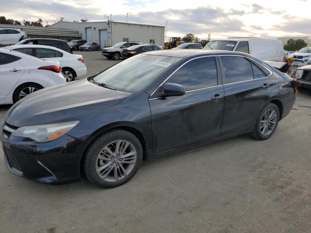 TOYOTA CAMRY LE 2017 with VIN 4T1BF1FK6HU777854 - Photo from auction