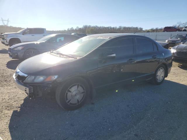 HONDA CIVIC HYBR 2011 with VIN JHMFA3F25BS000857 - Photo from auction