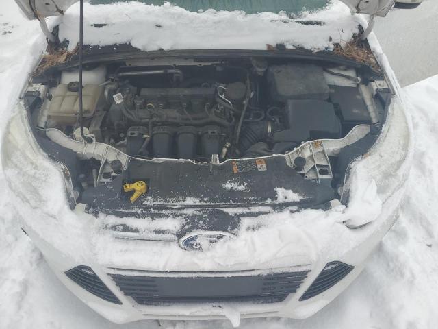 Photo 11 from auction – 2014 FORD FOCUS SE with VIN 1FADP3F21EL449643
