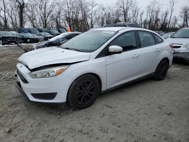 FORD FOCUS SE 2016 with VIN 1FADP3F27GL239132 - Photo from auction
