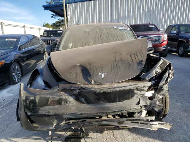 Photo 5 from auction – 2023 TESLA MODEL Y with VIN 7SAYGAEE7PF666053