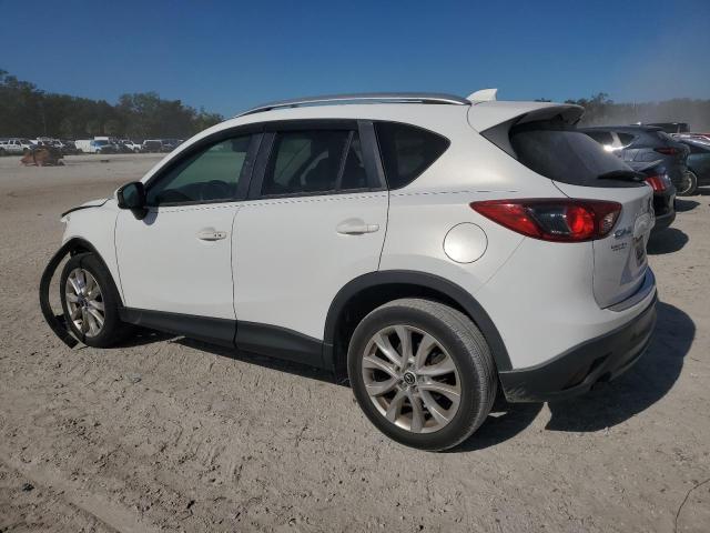 Photo 2 from auction – 2013 MAZDA CX-5 GT with VIN JM3KE2DE2D0141080