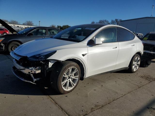 TESLA MODEL Y 2023 with VIN 7SAYGAEEXPF640241 - Photo from auction
