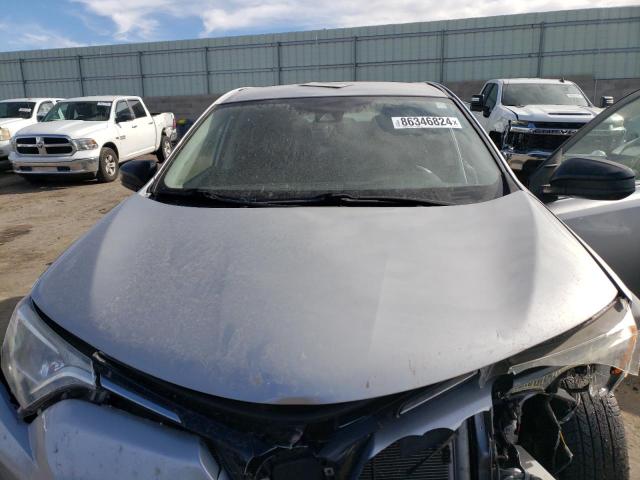 Photo 12 from auction – 2018 TOYOTA RAV4 LE with VIN JTMBFREV8JJ196491