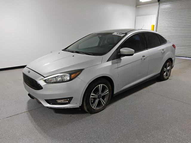 FORD FOCUS SE 2018 with VIN 1FADP3FE8JL211728 - Photo from auction