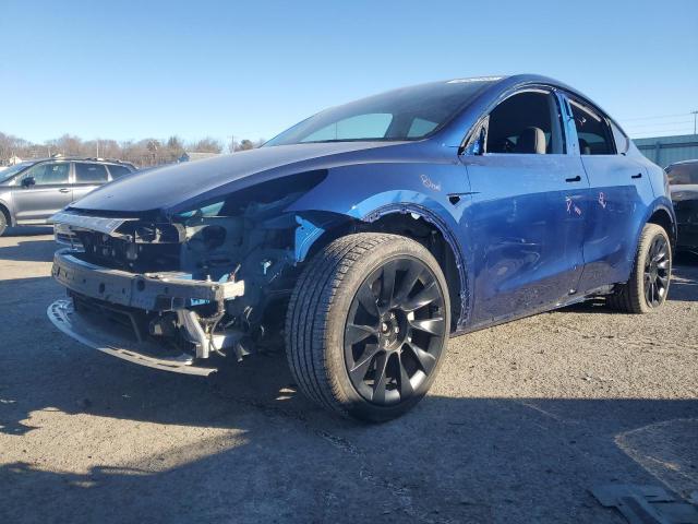 TESLA MODEL Y 2023 with VIN 7SAYGDEE0PA196351 - Photo from auction