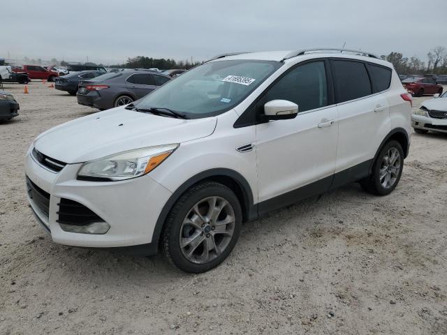 FORD ESCAPE TIT 2016 with VIN 1FMCU0JX0GUB36866 - Photo from auction
