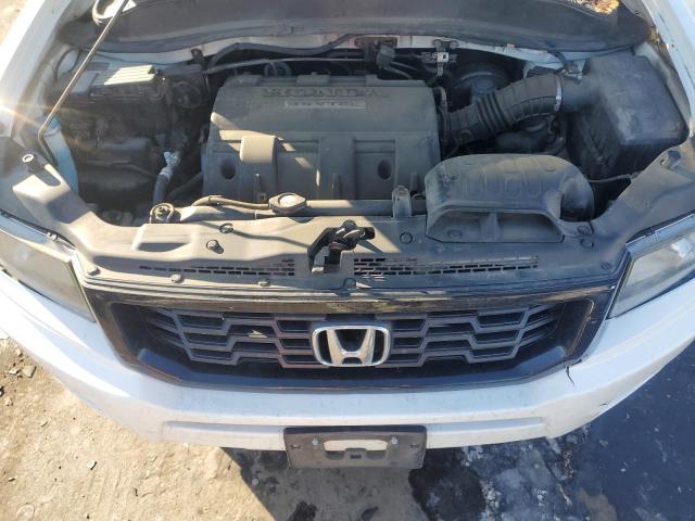 Photo 11 from auction – 2014 HONDA RIDGELINE with VIN 5FPYK1F61EB009773