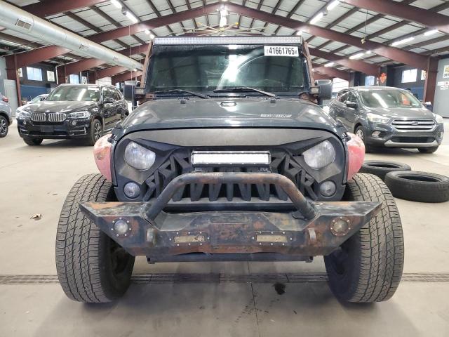 Photo 5 from auction – 2016 JEEP WRANGLER U with VIN 1C4BJWDG8GL264107