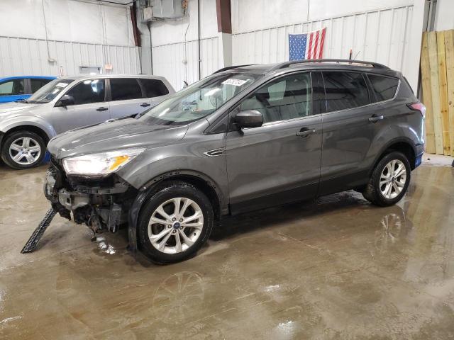 FORD ESCAPE SE 2018 with VIN 1FMCU9GD6JUA02520 - Photo from auction