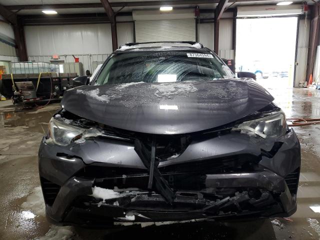 Photo 5 from auction – 2018 TOYOTA RAV4 LE with VIN JTMBFREV7JJ191203