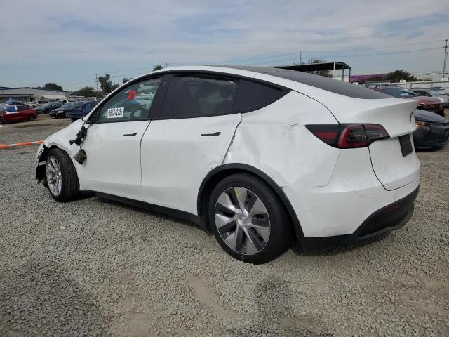 Снимка 2 от търг – 2023 TESLA MODEL Y с VIN 7SAYGAEE6PF741728