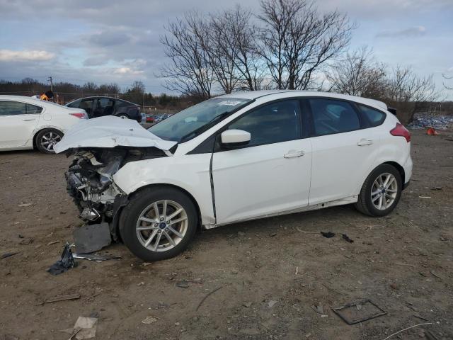 FORD FOCUS SE 2018 with VIN 1FADP3K29JL285168 - Photo from auction