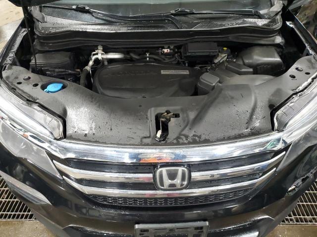 Photo 12 from auction – 2017 HONDA PILOT ELIT with VIN 5FNYF6H01HB047592