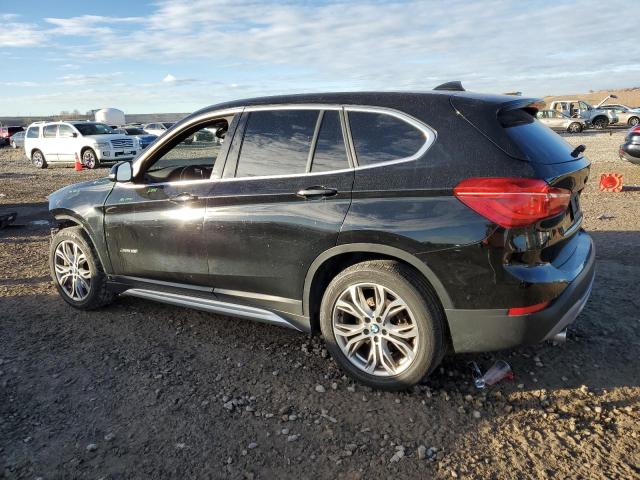 Photo 2 from auction – 2018 BMW X1 XDRIVE2 with VIN WBXHT3C3XJ5K22733