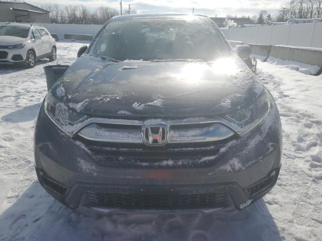 Photo 5 from auction – 2017 HONDA CR-V LX with VIN 7FARW5H3XHE012935