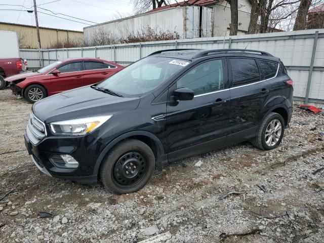 FORD ESCAPE SE 2018 with VIN 1FMCU0GD7JUC17755 - Photo from auction