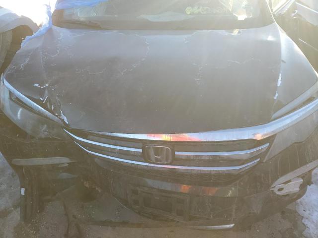 Photo 12 from auction – 2016 HONDA PILOT ELIT with VIN 5FNYF6H03GB070029