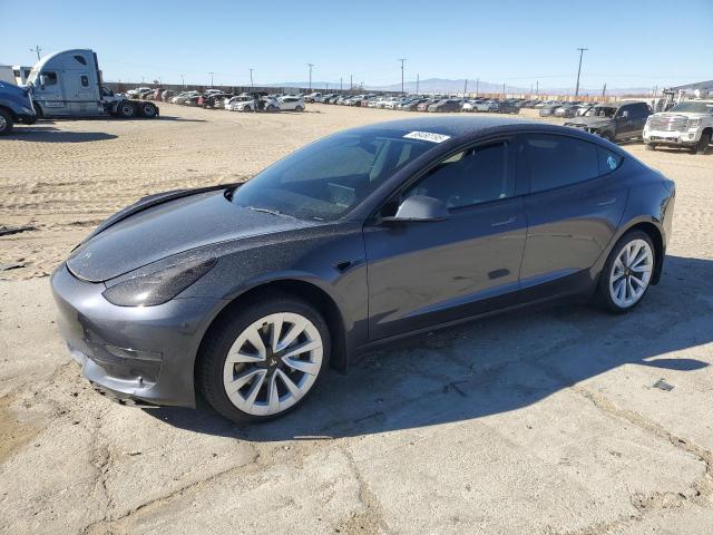 TESLA MODEL 3 2022 with VIN 5YJ3E1EAXNF211544 - Photo from auction