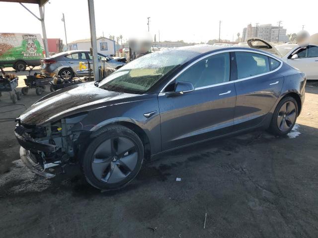 TESLA MODEL 3 2020 with VIN 5YJ3E1EAXLF631690 - Photo from auction