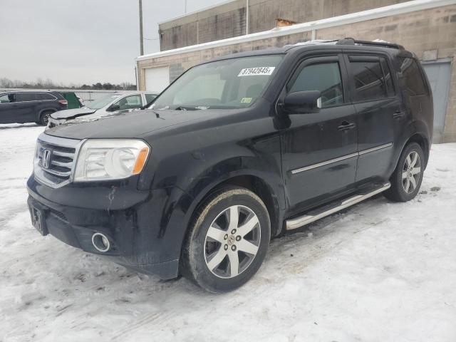 HONDA PILOT TOUR 2015 with VIN 5FNYF4H94FB032553 - Photo from auction