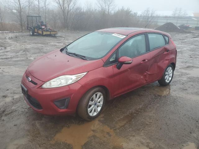 FORD FIESTA SE 2013 with VIN 3FADP4EJ2DM129842 - Photo from auction