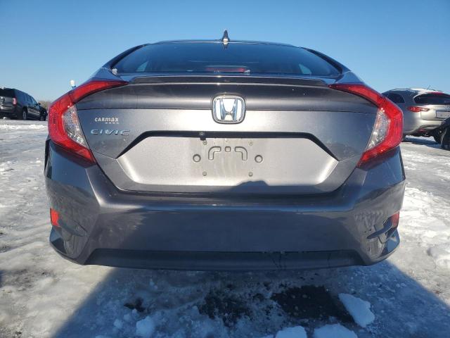 Photo 6 from auction – 2017 HONDA CIVIC EX with VIN 2HGFC1F34HH637085