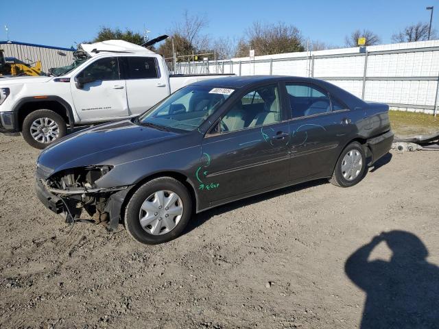 TOYOTA CAMRY LE 2002 with VIN JTDBE32KX20033908 - Photo from auction