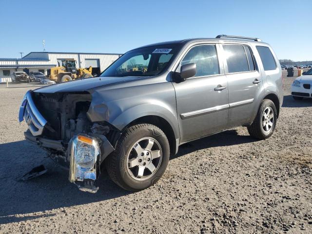 HONDA PILOT TOUR 2011 с VIN 5FNYF3H94BB021718 - Фото с аукциона