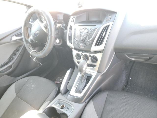 Foto 8 de la subasta – 2013 FORD FOCUS SE con VIN 1FADP3K28DL281004