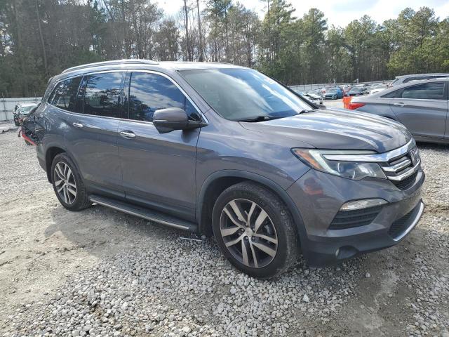 Photo 4 from auction – 2018 HONDA PILOT TOUR with VIN 5FNYF5H93JB003642