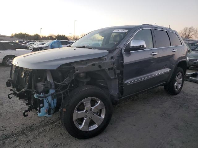 JEEP GRAND CHER 2011 with VIN 1J4RR6GG6BC655326 - Photo from auction