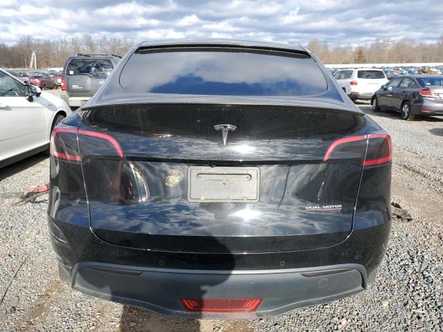 Photo 6 from auction – 2022 TESLA MODEL Y with VIN 7SAYGDEF4NF449499