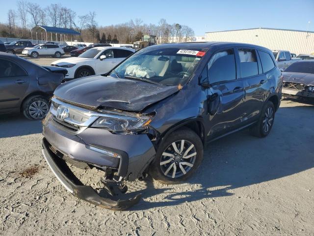 HONDA PILOT EXL 2022 with VIN 5FNYF5H59NB036356 - Photo from auction