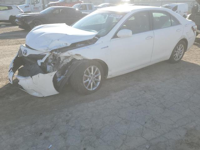 TOYOTA CAMRY HYBR 2011 with VIN 4T1BB3EK3BU133132 - Photo from auction