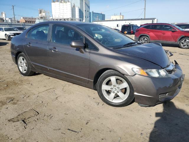 Photo 4 from auction – 2011 HONDA CIVIC LX-S with VIN 19XFA1F60BE036838