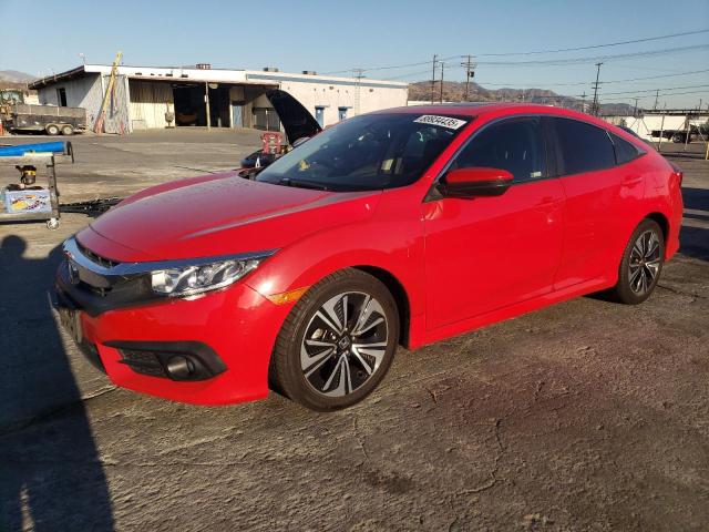 HONDA CIVIC EXL 2018 with VIN JHMFC1F74JX028936 - Photo from auction