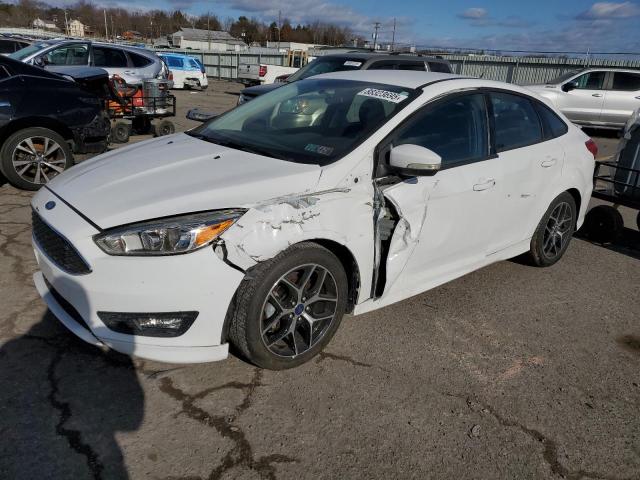 FORD FOCUS SE 2016 with VIN 1FADP3F25GL396917 - Photo from auction