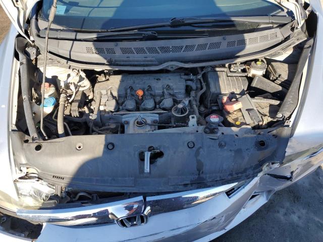 Photo 11 from auction – 2011 HONDA CIVIC LX-S with VIN 2HGFA1F66BH549663