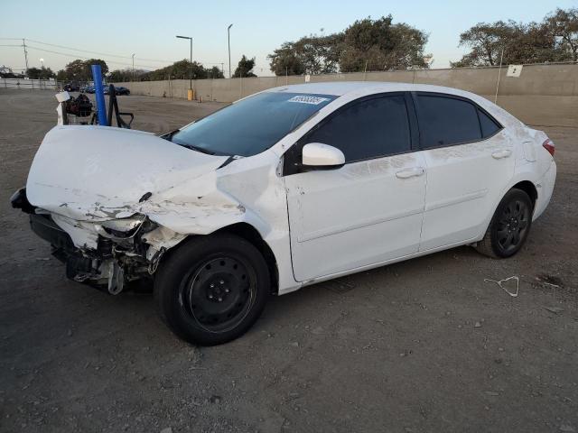 TOYOTA COROLLA L 2015 with VIN 5YFBURHE2FP212527 - Photo from auction