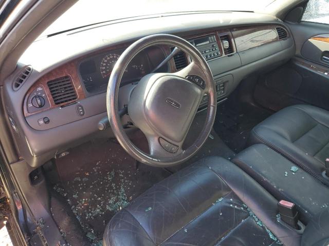 Photo 8 from auction – 2001 LINCOLN TOWN CAR E with VIN 1L1FM81W51Y704307