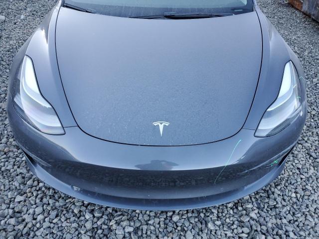 Photo 11 from auction – 2022 TESLA MODEL 3 with VIN 5YJ3E1EB5NF307218