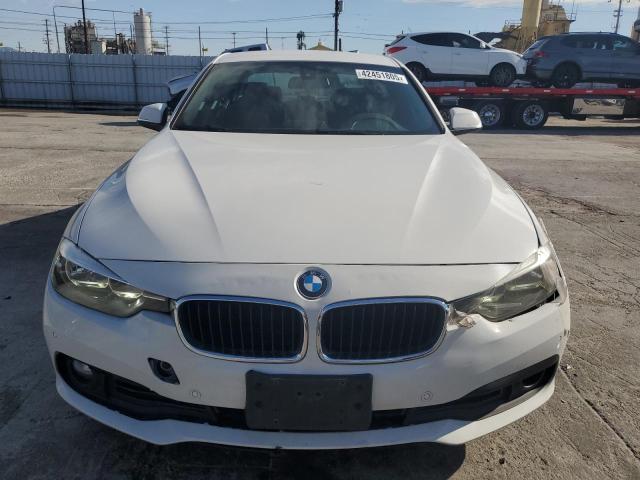 Photo 5 from auction – 2017 BMW 320 I with VIN WBA8E1G30HNU18838
